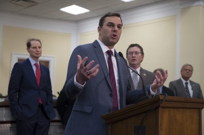 Rep. Justin Amash, I-Mich., center, left the Republican Party after saying President Doanld Trump should be impeacher for special counsel Robert Mueller's report. Mueller