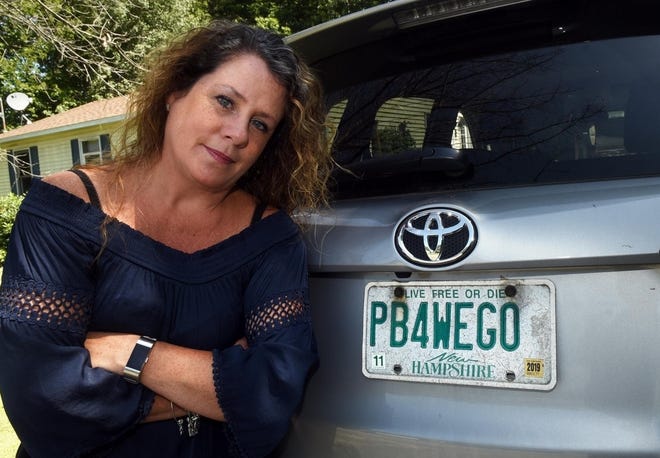 Wendy Auger of Rochester says the state recalling her 15-year-old vanity plate, PB4WEGO, because it refers to human waste. [DEB CRAM/FOSTERS.COM]