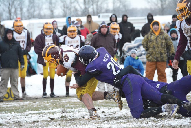 Pickford's Sam Burton sacks the Au Gres-Sims quarterback during an 8-Player state semifinal game last season. The Panthers kick off the 2019 season this Friday night [Rob Roos/Sault News]