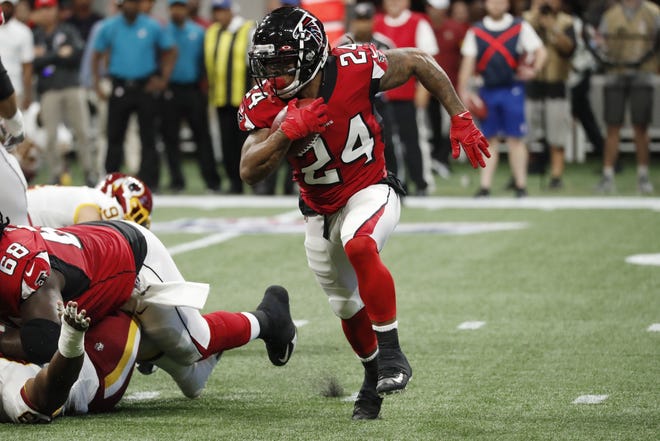 Atlanta Falcons running back Devonta Freeman and the Falcons play at Jacksonville in the preseason finale Thursday in a game set to be broadcast at 7 p.m. by WTOC and WSAV. [John Bazemore/Associated Press]