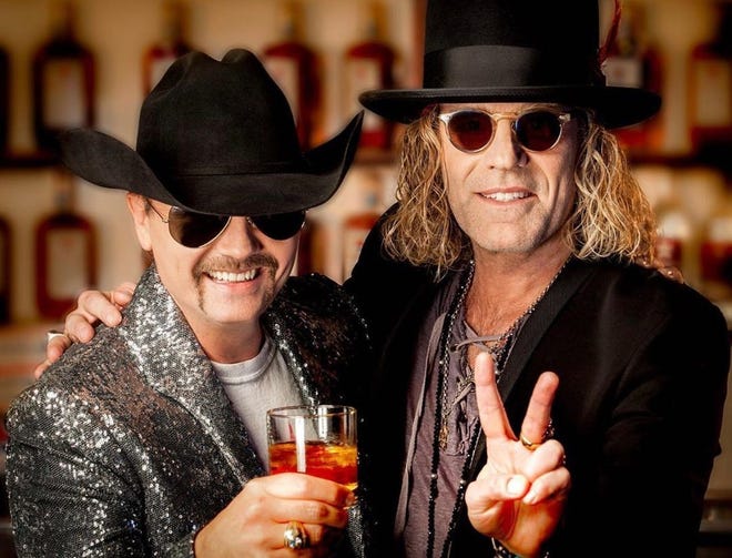 John Rich, left, and "Big Kenny" Alphin go on stage at 8:15 p.m. Sunday during Gulf Coast Jam at Frank Brown Park. [CONTRIBUTED PHOTO]