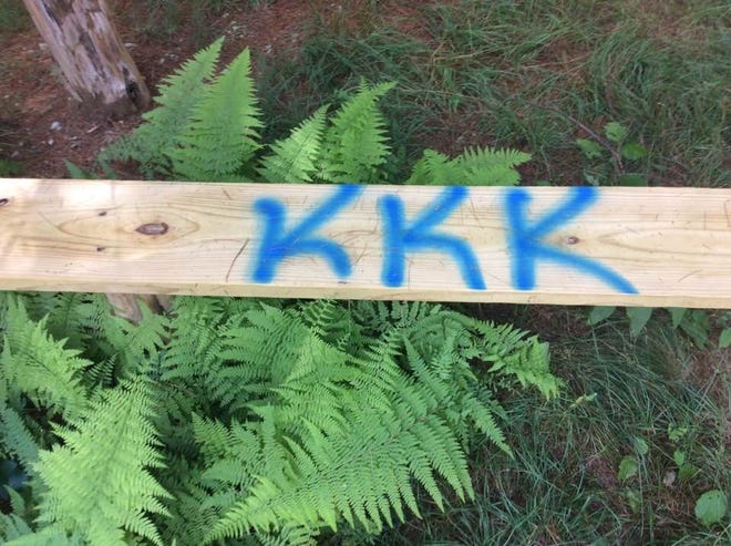 Some of the racist graffiti found at the Watuppa Reservation Thursday. [Courtesy of Kerri Helme]