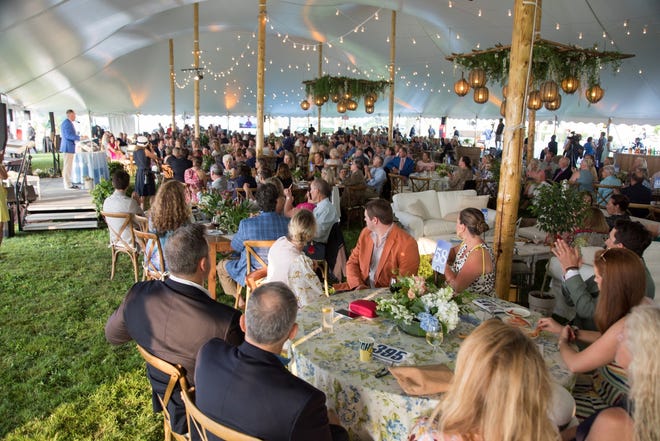 Nearly 500 friends and supporters of Newport Hospital attended A Salute to Health at the historic Eisenhower House raising more than $1 million for the hospital. [Photo by Kim Fuller]
