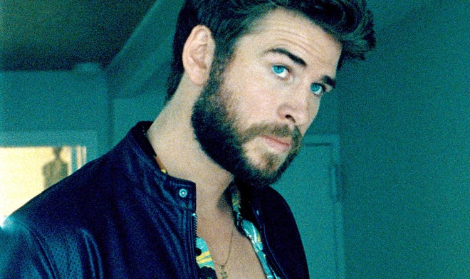 Liam Hemsworth stars as Moe Diamond who's involved in a small-time money-laundering operation in "Killerman." [Blue Fox Entertainment]