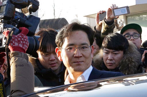 FILE - In this Feb. 5, 2018, file photo, Lee Jae-yong, vice chairman of Samsung Electronics, gets into a car to leaves a detention center in Uiwang, South Korea. (AP Photo/Ahn Young-joon, File)