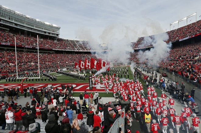 Ohio State Buckeyes players take the field prior to the NCAA football game against the Michigan State Spartans at Ohio Stadium in Columbus on Nov. 11, 2017. [Adam Cairns]