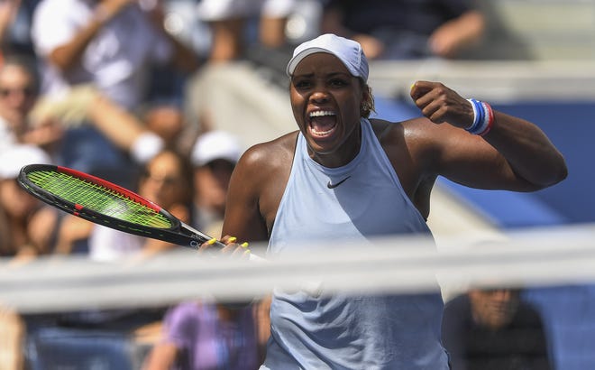 Taylor Townsend, of the United States, reacts after defeating Sorana Cirstea, of Romania, during round three of the US Open tennis championships Saturday, Aug. 31 in New York. SARAH STIER/THE ASSOCIATED PRESS