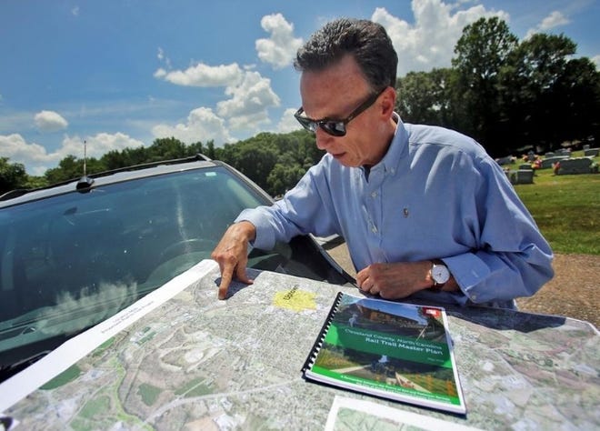 Shelby mayor, Stan Anthony, points out the route for the proposed rail trail. The plan is on track to acquire right of way with the help of a federal grant. [Brittany Randolph/The Star]