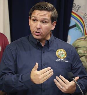 Gov. Ron DeSantis speaks about Hurricane Dorian during a press conference at the Orange County Emergency Operations Center on Friday in Orlando. [Stephen M. Dowell/Orlando Sentinel via AP]
