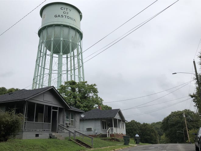 Gastonia leaders are close to formally approving a contract to demolish the historic Loray Mill village water tower at a cost of $348,000. [Michael Barrett/The Gaston Gazette]