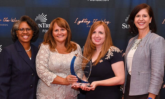Goodwill Southeast Georgia was awarded a 2019 Lighting the Way Award and $75,000 grant by the SunTrust Foundation. [Photo courtesy of Goodwill and SunTrust]