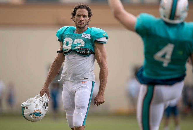 Long snapper John Denney played for eight Miami Dolphins coaches. [ALLEN EYESTONE/The Palm Beach Post]