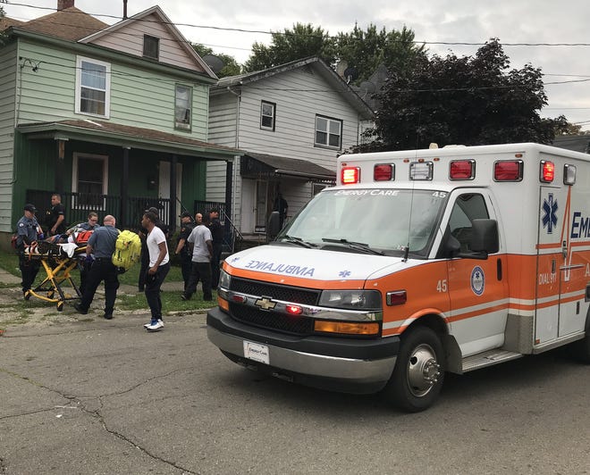 A teenage boy was taken to the hospital for treatment after Erie police said he was wounded in a shooting in the 300 block of East 24th Street late Sunday afternoon. [TIM HAHN / ERIE TIMES-NEWS]