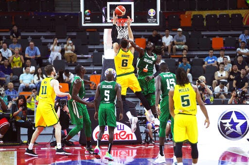 Australia's Andrew Bogut attempts a shot during a group H match against Senegal in the FIBA Basketball World Cup 2019 in Dongguan in south China's Guangdong province on Tuesday, Sept. 3, 2019. (AP Photo)