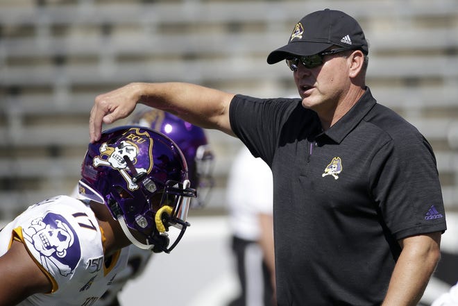 East Carolina head coach Mike Houston said Tuesday the offensive line must develop schematically and running backs must break tackles against Gardner-Webb. [Gerry Broome/The Associated Press]