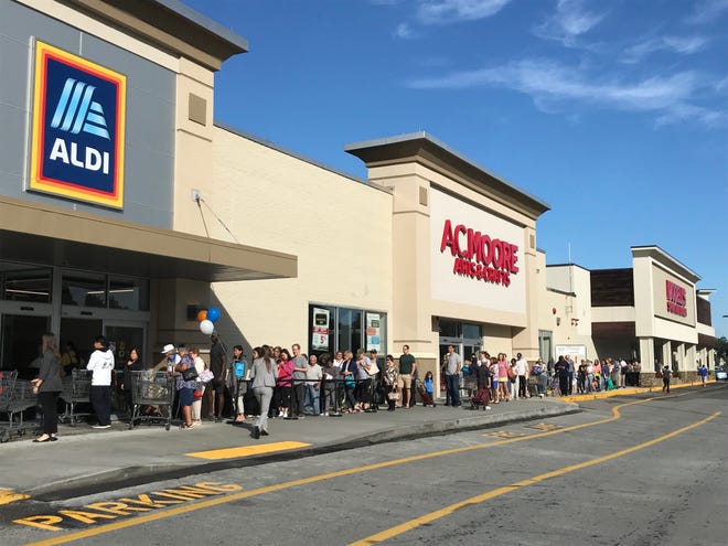 Around 200 residents from Medford and other surrounding communities showed up to ALDI in Medford for its grand reopening on Thursday morning. [Wicked Local Photo / Robby McKittrick]