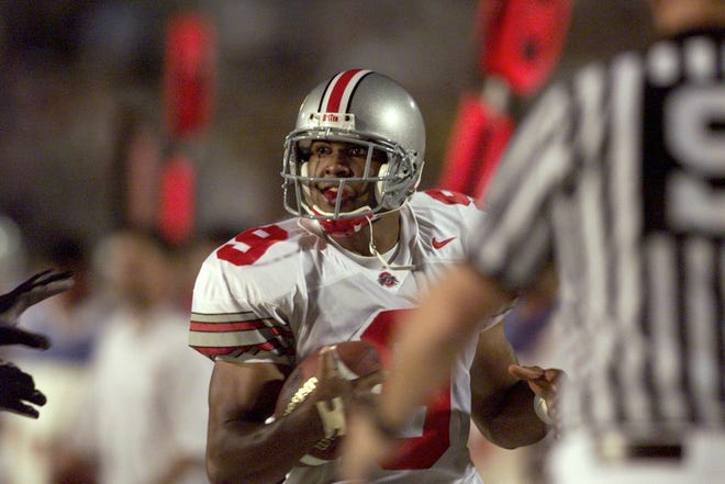David Boston scores a second-quarter touchdown for Ohio State in a game against West Virginia. [File photo]