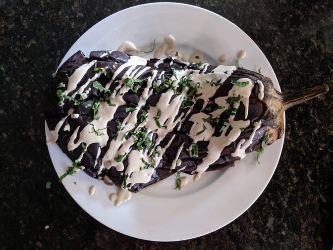 Regular baba ghanoush is delicious, but the recipe can also be altered for a whole roasted eggplant for a main dish. [Courtesy/Amanda Miller]