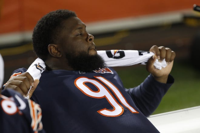 Chicago Bears nose tackle Eddie Goldman watches during the second half of an NFL preseason football game against the Tennessee Titans, Thursday, Aug. 29, 2019, in Chicago. (AP Photo/Charles Rex Arbogast)