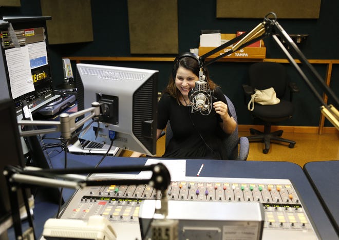 In this July 25 photo, Katarina Lauver, The Morning Show disc jockey at WMNF 88.5, works inside a studio in Tampa. [Photos by Octavio Jones/Tampa Bay Times via AP]