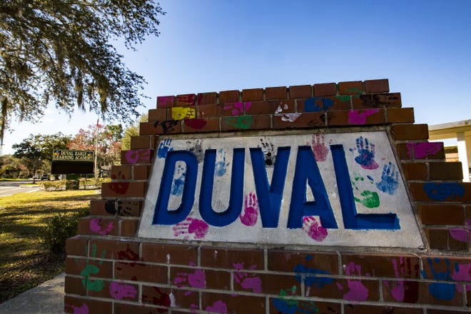 The sign outside Duval Early Learning Academy welcomes people to this area on the east side of Gainesville. [FILE PHOTO/SPECIAL TO THE GUARDIAN]