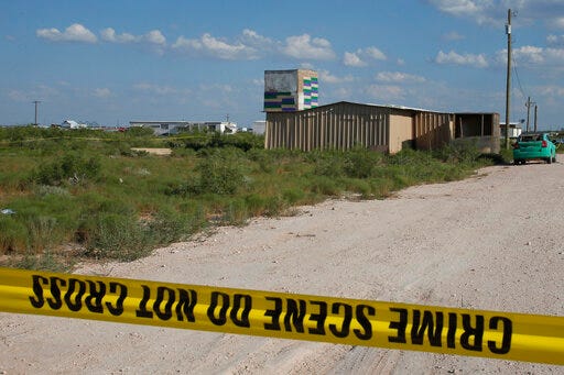 Crime scene tape surrounds the home of Seth Aaron Ator, the alleged gunman in a West Texas rampage Saturday, on Monday, Sept. 2, 2019, near Odessa, Texas. Officers killed 36-year-old Ator on Saturday outside a busy Odessa movie theater after a spate of violence that spanned 10 miles (16 kilometers), killing multiple people and injuring around two dozen others. (AP Photo/Sue Ogrocki)