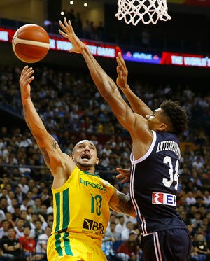 Alex Garcia of Brazil puts up a shot against Giannis Antetokounmpo of Greece during their group stage match in the FIBA Basketball World Cup in Nanjing in eastern China's Jiangsu province, Tuesday, Sept. 3, 2019. (Chinatopix via AP)