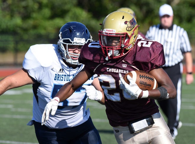 Running back Lorensky Estinvil, right, ran for 187 rushing yards and two touchdowns on 28 carries in Cape Tech's season-opening victory over Bristol-Plymouth on Saturday at Monomoy Regional High School in Harwich. [PHOTO BY PAUL DRAKE]