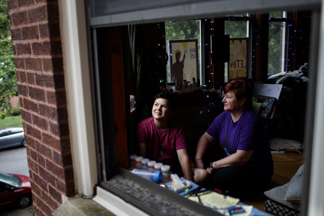 Michelle Vallet and her son are shown in their Chicago home. Vallet supports a law requiring schools to teach contributions of LGBT people. Her son, whom she asked not to name, identifies as transgender. [Armando L. Sanchez/Chicago Tribune/TNS]