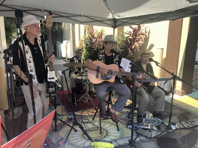 Luis Mario and His Latin Band perform at the Gamble Rogers Showcase on Aviles Street on Saturday.