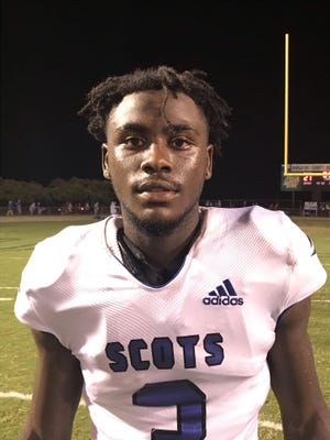Scotland running back/wide receiver Bruce Wall kept some of the Fighting Scots' drives alive in Friday's win, including a fourth-down conversion for a touchdown. [Rodd Baxley/The Fayetteville Observer]