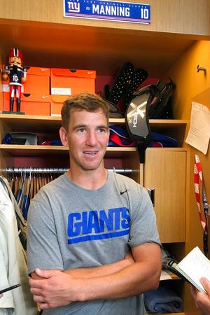 New York Giants quarterback Eli Manning speaks with the media in East Rutherford, N.J., Wednesday, Sept. 4, 2019. Manning heads into his 16th season with the Giants as they take on the Dallas Cowboys on Sunday in Arlington, Texas. (AP Photo/Tom Canavan)