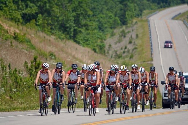 Cherokee Nation and Eastern Band of Cherokee Indians cyclists climb a Missouri hill during the 2019 Remember the Removal Bike Ride. Applications for the 2020 bike ride are due Oct. 11. [Photo courtesy Cherokee Nation]