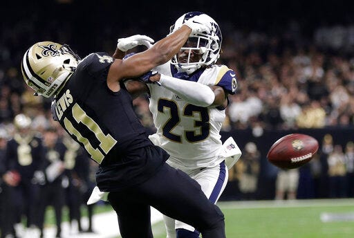 FILE - In this Jan. 20, 2019, file photo, Los Angeles Rams' Nickell Robey-Coleman breaks up a pass intended for New Orleans Saints' Tommylee Lewis during the second half of the NFL football NFC championship game in New Orleans. Louisiana's Supreme Court has dismissed a Saints fan's lawsuit against the NFL and game officials over the failure to call a crucial penalty against the Los Angeles Rams in a January playoff game. Attorney Antonio LeMon had sued, alleging fraud and seeking damages over what's come to be known as the "Nola No-Call." (AP Photo/Gerald Herbert, File)
