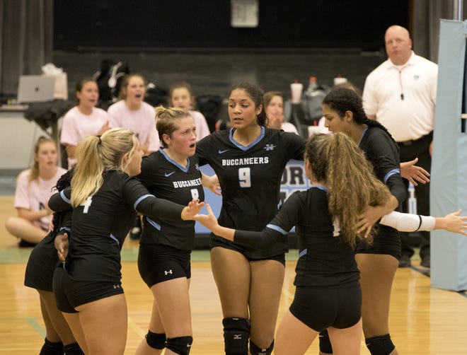 North Bay Haven gathers after a point during a home match against West Florida on Saturday. [JOSHUA BOUCHER/THE NEWS HERALD]