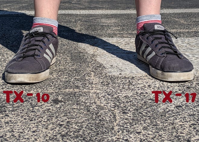During testimony Tuesday, Robyn Honig showed the Texas House Redistricting Committee a photo of her husband standing in the middle of the street in front of their Northwest Austin home, his feet simultaneously in two congressional districts. [Robyn Honig]