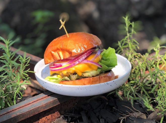 The cheeseburger at Better Half is one of the best in town. [Matthew Odam AMERICAN-STATESMAN]