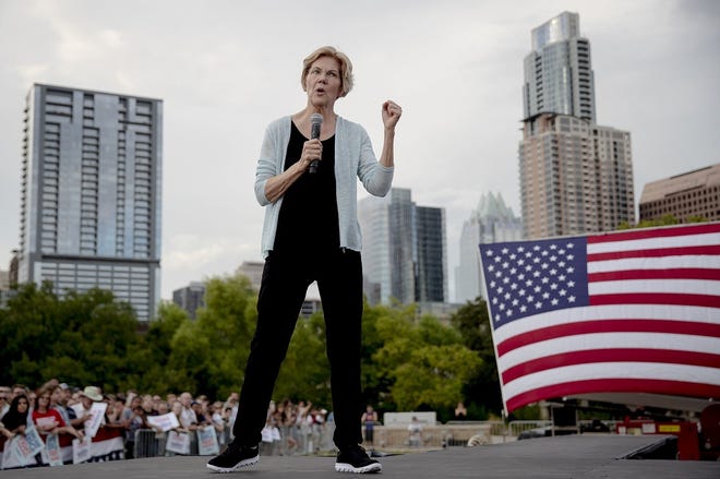 Democratic presidential candidate Elizabeth Warren of Massachusetts speaks during a rally on Tuesday night at Vic Mathias Shores. [NICK WAGNER/AMERICAN-STATESMAN]