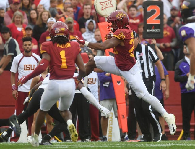 Iowa State's Sheldon Croney hurdled a Northern Iowa defender to pick up a first down during the Cyclones' 29-26 triple-overtime victory in Week 1 at Jack Trice Stadium. Photo by Nirmalendu Majumdar/Ames Tribune