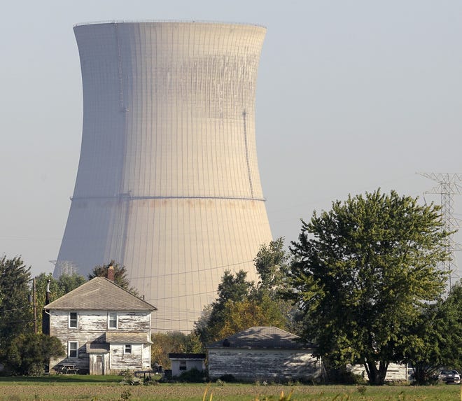 The cooling tower of the Davis-Besse Nuclear Power Station in Oak Harbor, Ohio, on Lake Erie. [Amy Sancetta/AP]