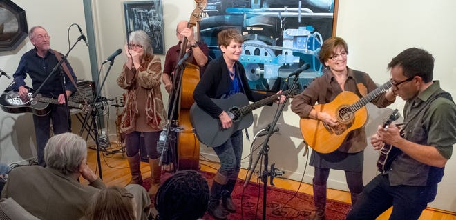 The Hot Flashes are the featured entertainment at 7 p.m. Monday night. From left are Roger Williams (dobro and vocals), Peggy Ann Harvey (fiddle, viola, soprano saxophone, harmonica and vocals), John Urbanik (bass and vocals), Amy Gallatin (guitar, banjouke and vocals), Gail Wade (guitar, clawhammer banjo and vocals) and JD Williams (mandolin, fiddle and vocals). Information on the band can be found at thehotflashesmusic.com. [Marilyn  Catasus]