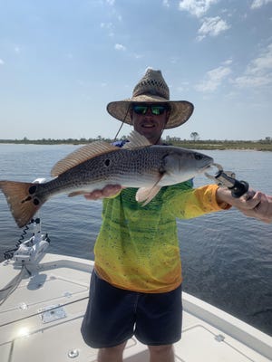AJ's brother Colby shows off his 23.5-inch red. [CONTRIBUTED PHOTOS]