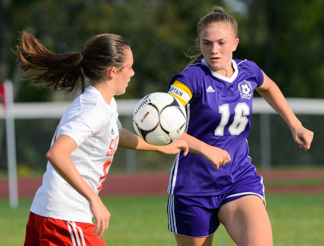 Little Falls Mountie Caileigh Barnett (16) defends against Sauquoit Valley Indian Alena Weibel during Wednesday's match in Little Falls. 

[Alex Cooper / Observer-Dispatch]