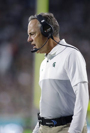 Michigan State coach Mark Dantonio reacts on the sideline during the second quarter of an NCAA college football game against Western Michigan, Saturday, Sept. 7, 2019, in East Lansing, Mich. Michigan State won 51-17. (AP Photo/Al Goldis)