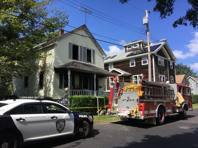 A fire broke out at a Clinton Street home Friday morning in Newport. [SCOTT BARRETT/DAILY NEWS PHOTO]