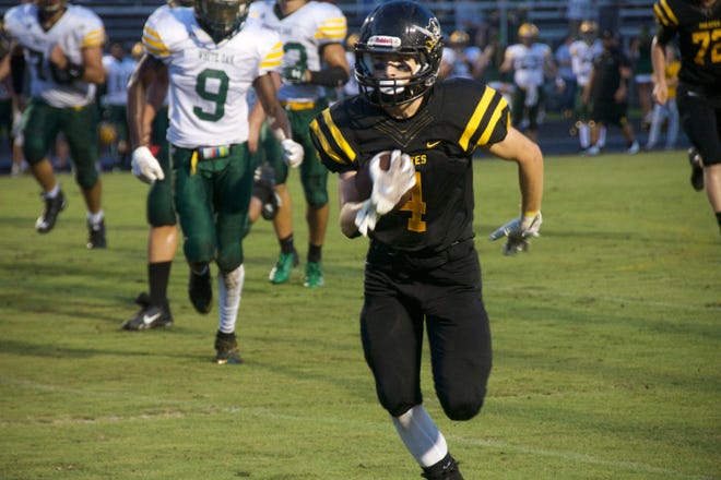 Topsail running back Bernie Burns and the Pirates beat White Oak on Friday. [NOAH POWERS/FOR STARNEWS]