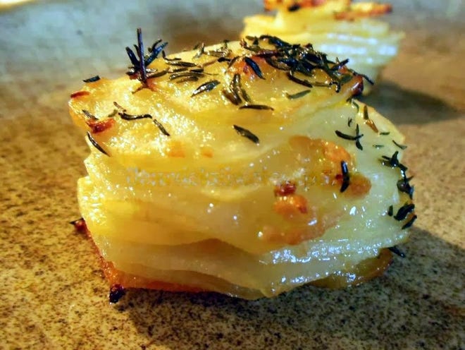 Potato Stacks with Garlic and Thyme. [Laura Tolbert/Special to The Times]
