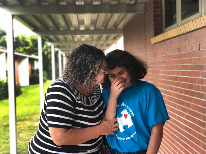 Ana Koberstine and her 10-year-old daughter, who is autistic. Koberstine says the Polk County school district has struggled to ensure her daughter receives the educational services she needs. [KIMBERLY C. MOORE/THE LEDGER]