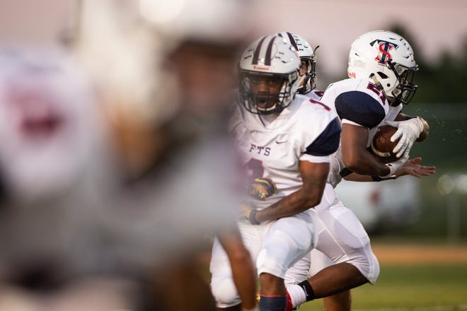 The evolution of the Terry Sanford Bulldogs’ passing game will be vital in coming weeks because teams are stacking the box against smashmouth running back Dorian Clark and making it difficult for the dynamic runner to make plays between the tackles. [Andrew Craft/The Fayetteville Observer]