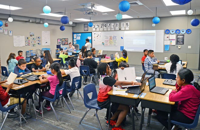 Fourth grade students at Morrison Elementary School work on Friday, Sept. 13, 2019, in a classroom enclosed by four walls. Previously, the school's classrooms had an open concept that could be distracting at times for students. [BRIAN D. SANDERFORD/TIMES RECORD]